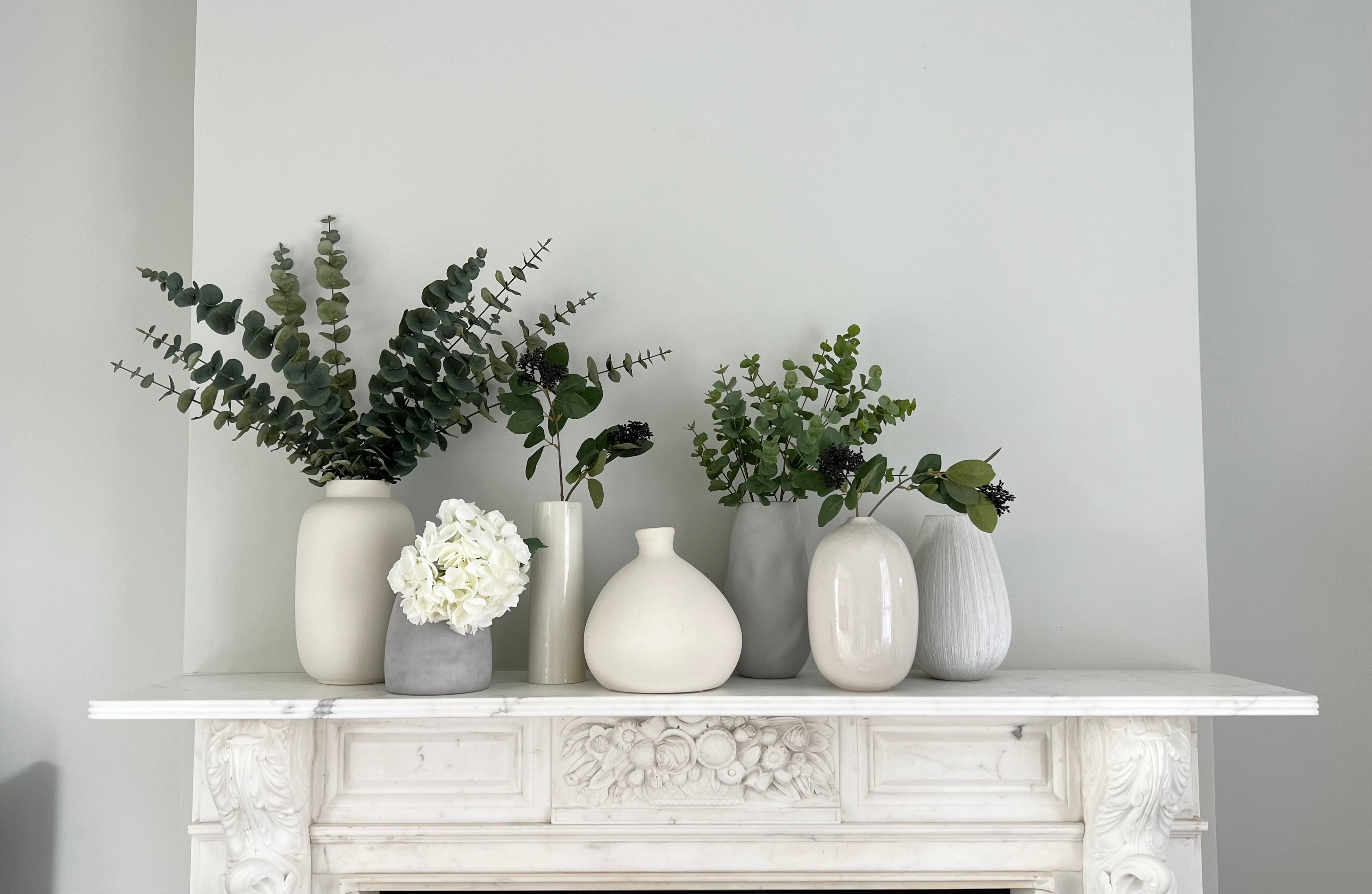 Discover our collection of exquisite ceramic vases the perfect way to enhance  our realistic and lifelike artificial flowers