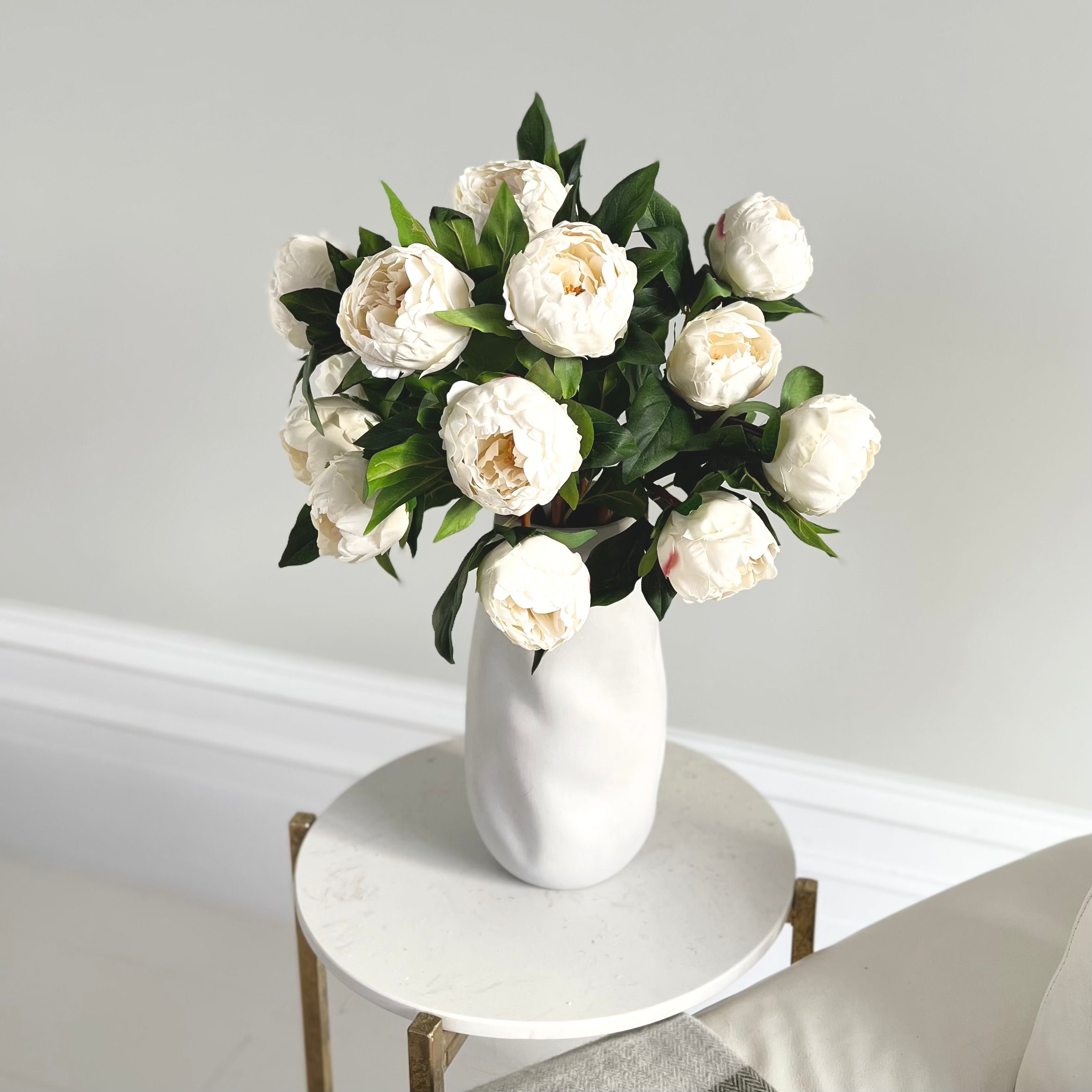 Luxury Lifelike Realistic Artificial Fabric Silk Blooms with Foliage Buy Online from The Faux Flower Company | 7 stems of White Real Touch Peony ABZ9148WH styled in Naunton Vase ABP525B