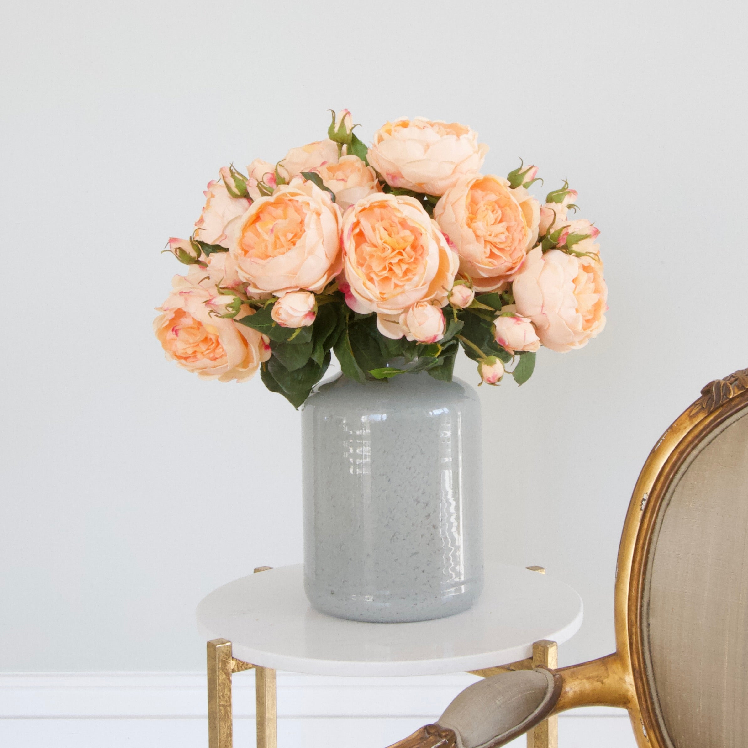 Luxury Lifelike Realistic Artificial Fabric Silk Blooms with Foliage Buy Online from The Faux Flower Company | Peach English Rose ABY5013PC styled in Grey Funnel Neck Vase ABV0144