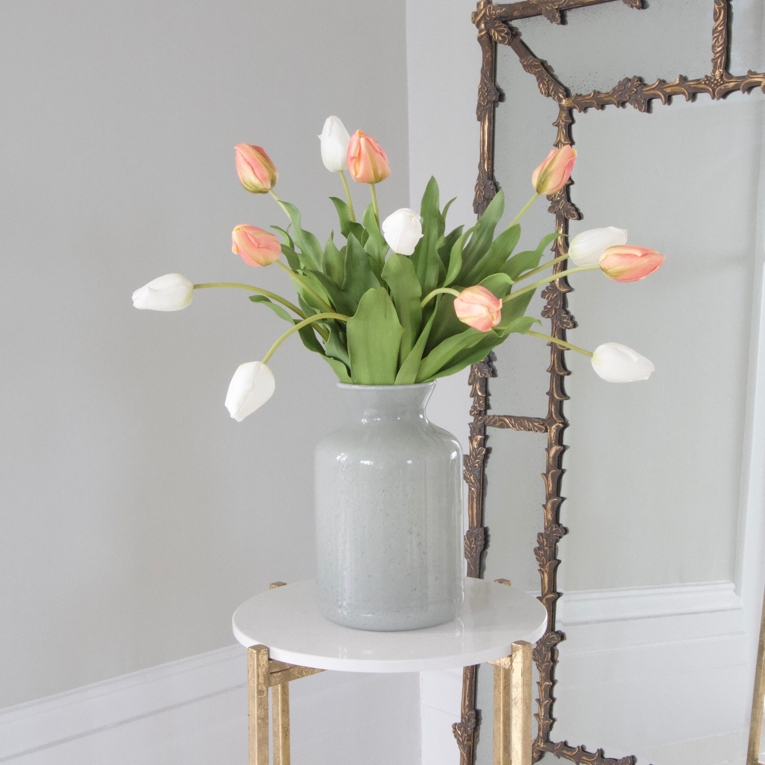 Luxury Lifelike Realistic Artificial Fabric Silk Blooms with Foliage Buy Online from The Faux Flower Company | 12 stems Orange Tulip ABY5657OR styled in Glass Funnel Neck Vase 